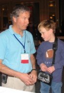 Mike showing BrailleNote GPS Jacob Gross, age 6 - one of Sendero's youngest GPS users, at CTEVH 2006